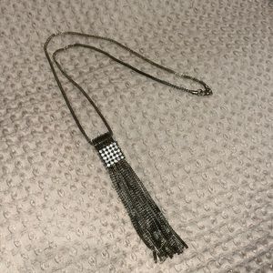 Gold tone tassel necklace